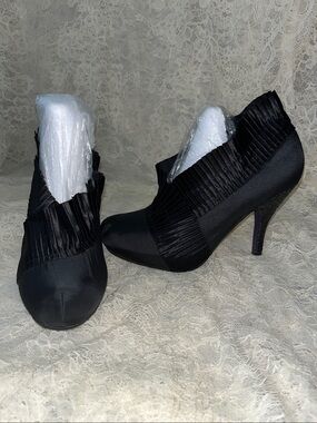 Poetic License black “shootie”. Size 6.5 (36 1/2).